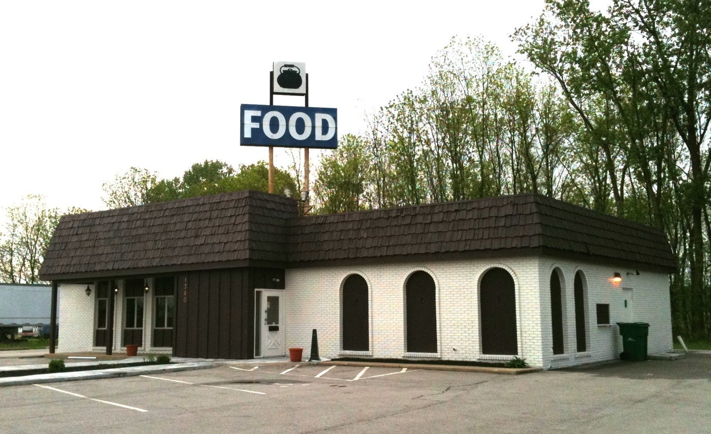A building with a sign that says FOOD